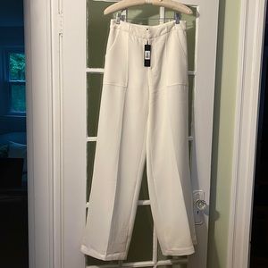 White polyester pants, size M, NWT